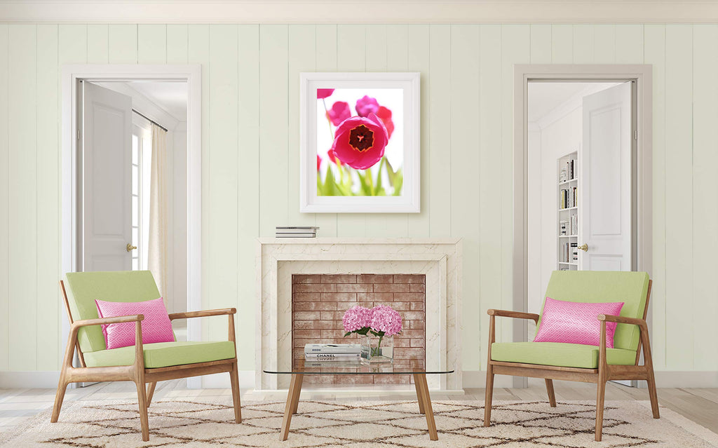neutral living room with a pop of color, pink and green living room, living room spring decor, spring art, art over mantle, tulip art